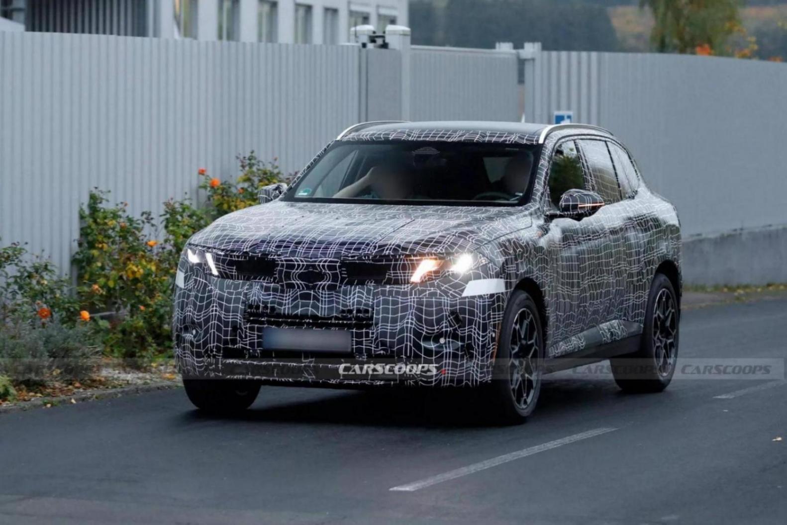 全新寶馬X5終露燈組真容,內飾細節首度曝光,5種動力 2026年投產